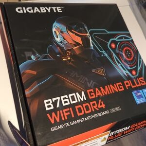 GIGABYTE B760M Gaming Plus WiFi DDR4 in Black and Orange